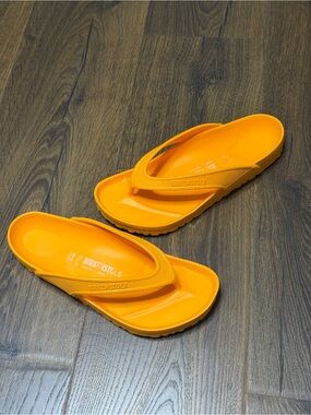 Birkenstock EVA Flip Flops in Bright Orange women’s 39